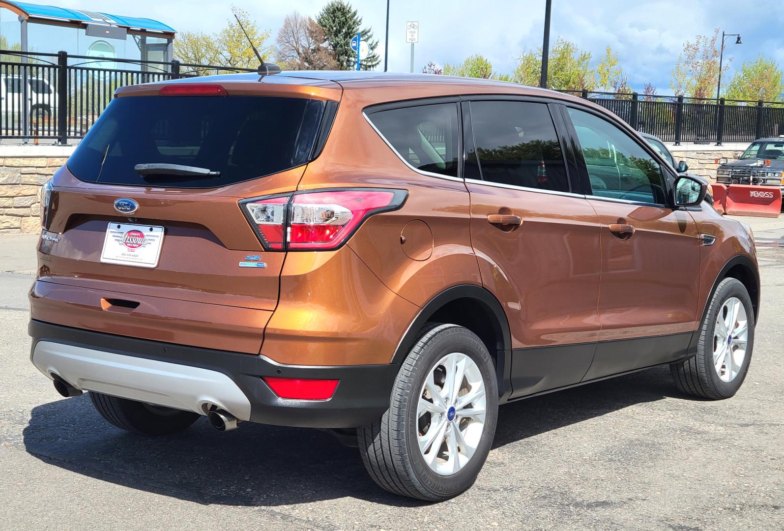 2017 Copper /Black Ford Escape SE (1FMCU9GD1HU) with an 1.5L I4 engine, 6 Speed Auto transmission, located at 450 N Russell, Missoula, MT, 59801, (406) 543-6600, 46.874496, -114.017433 - Nice Low Mile All Wheel Drive. Only 59K Miles. 1.5L I4 Engine. 6 Speed Automatic Transmission. Very Clean. Power drivers Seat. Air. Cruise. Tilt. Power Windows and Locks. Backup Camera. - Photo#6